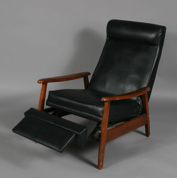 Appraisal: Danish modern recliner open arm construction fold out foot rest