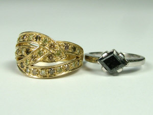 Appraisal: A ct white gold and black diamond single stone ring