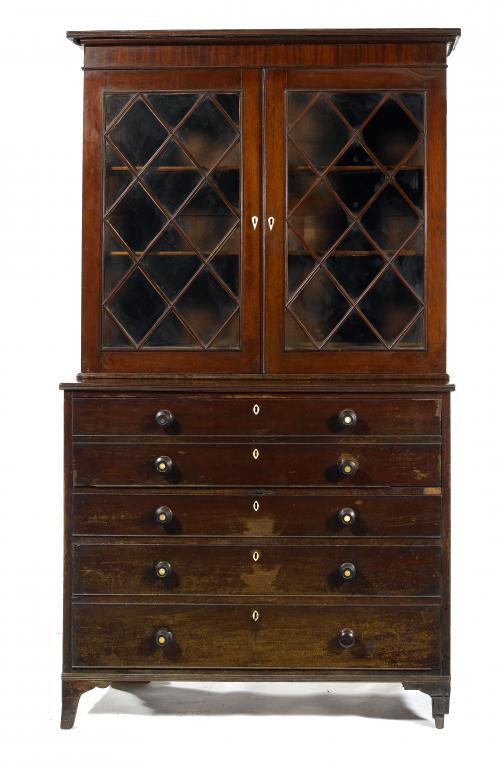 Appraisal: A GEORGE III MAHOGANY CHEST OF DRAWERS fitted with a