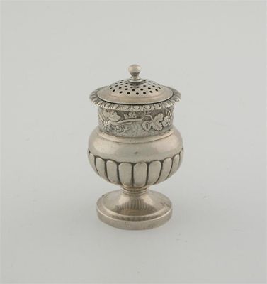 Appraisal: A Colonial pepper caster of squat form part fluted lower