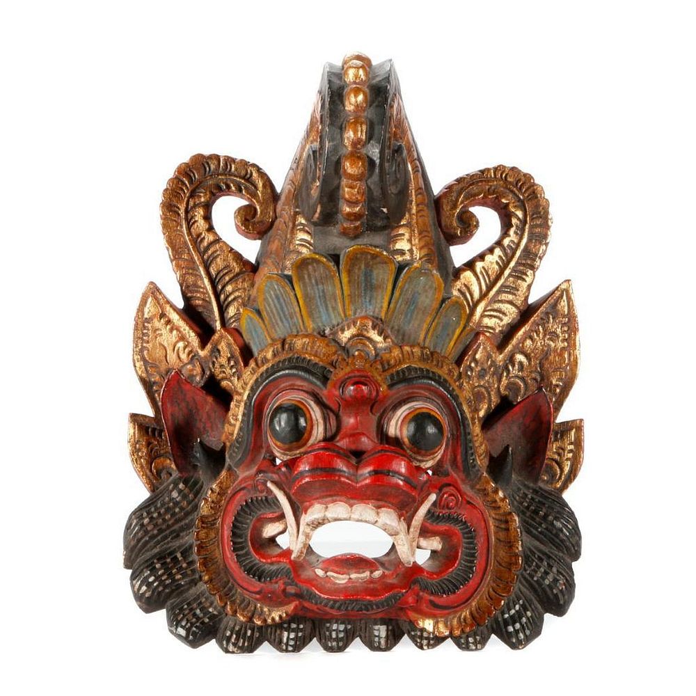 Appraisal: A Balinese mask A carved wood Balinese mask measuring inches