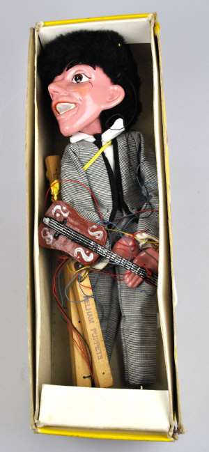 Appraisal: Pelham Puppet 'Pop Singer' c w guitar in original yellow