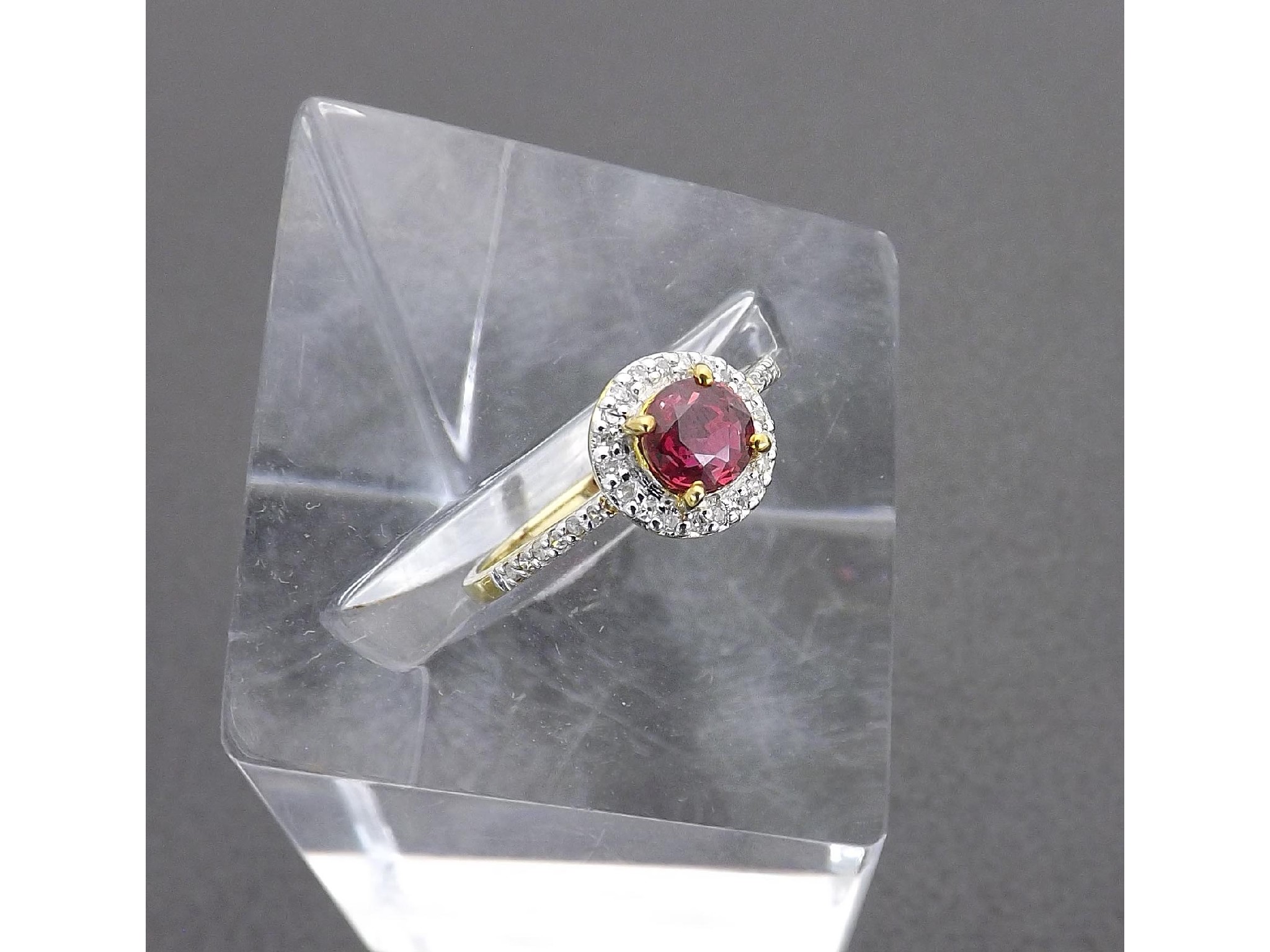 Appraisal: - -A Diamond and synthetic ruby cluster ring with diamond