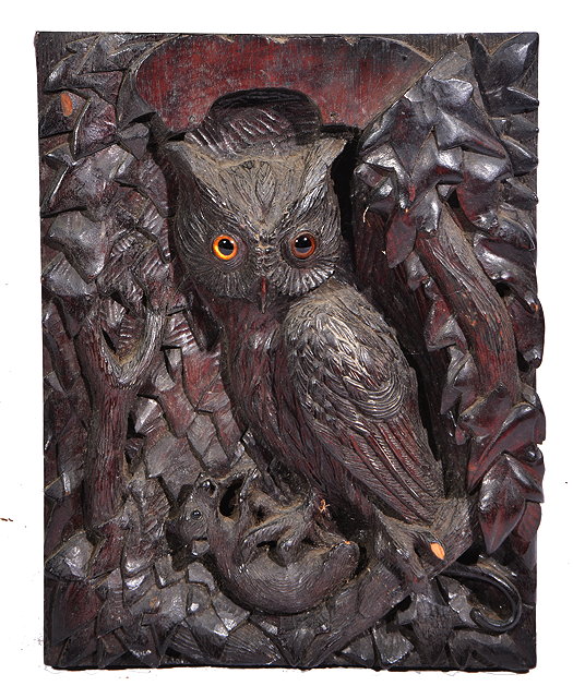 Appraisal: AN ANTIQUE BLACKFOREST CARVED PANEL depicting an owl and a