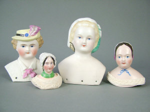 Appraisal: Four continental Parian and china heads each painted in colours