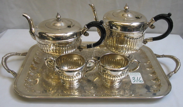 Appraisal: A ENGLISH STYLE FOUR PIECE SILVERPLATED TEA SET on a