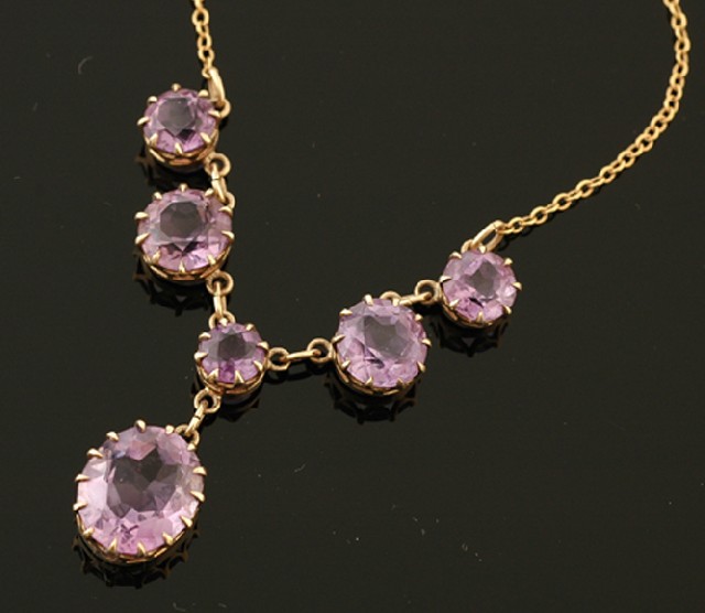 Appraisal: An Edwardian amethyst necklace Circa Having five round faceted amethysts