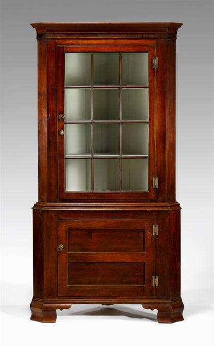 Appraisal: Cherry corner cupboard circa With flat cove molded and reeded