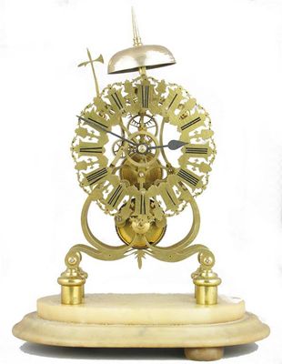 Appraisal: A th century 'Gothic' brass skeleton clock the single fusee