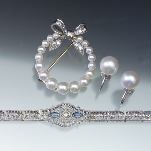 Appraisal: ART DECO k white gold filigree diamond and sapphire bracelet