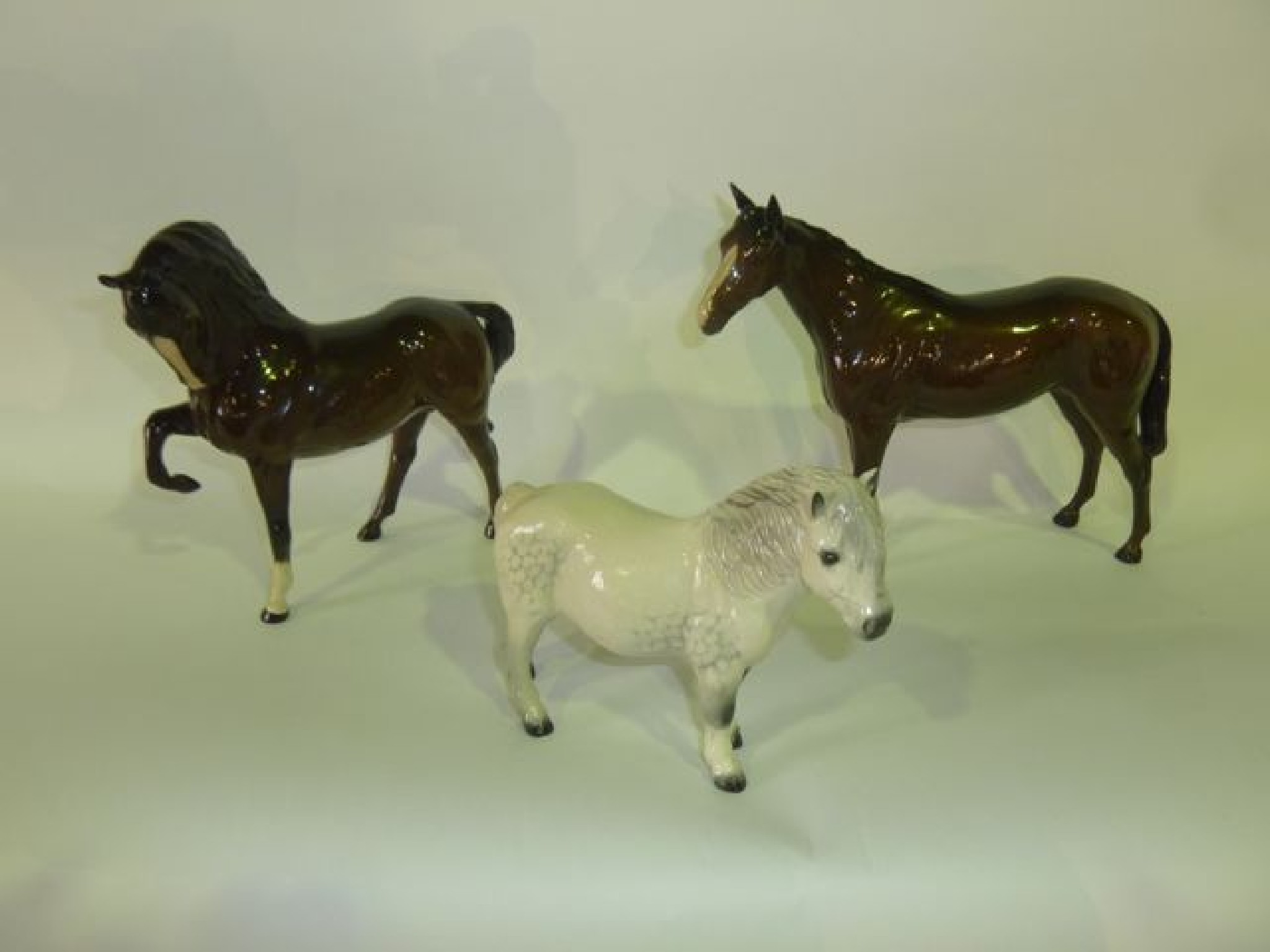 Appraisal: A collection of three Royal Doulton equestrian figures comprising a