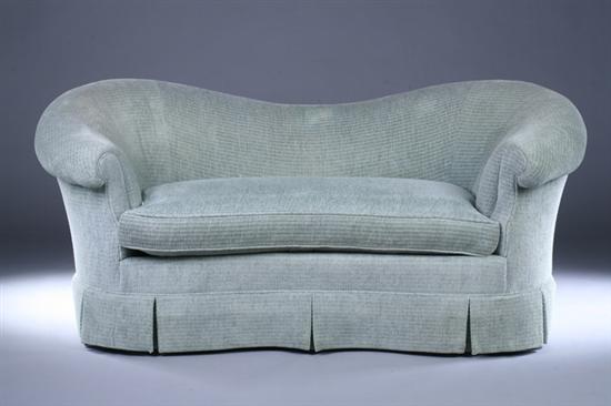 Appraisal: BAKER KIDNEY-SHAPED UPHOLSTERED LOVESEAT late th century with stone green