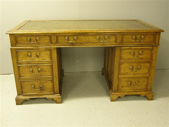 Appraisal: th Century style oak pedestal desk seven single drawers one