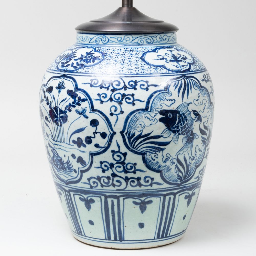 Appraisal: Chinese Blue and White Jar Mounted as a Lamp The