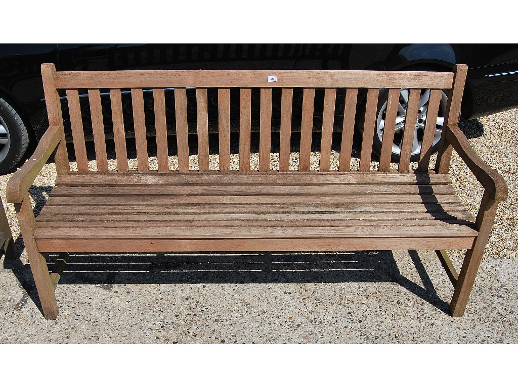 Appraisal: Slatted teak garden bench