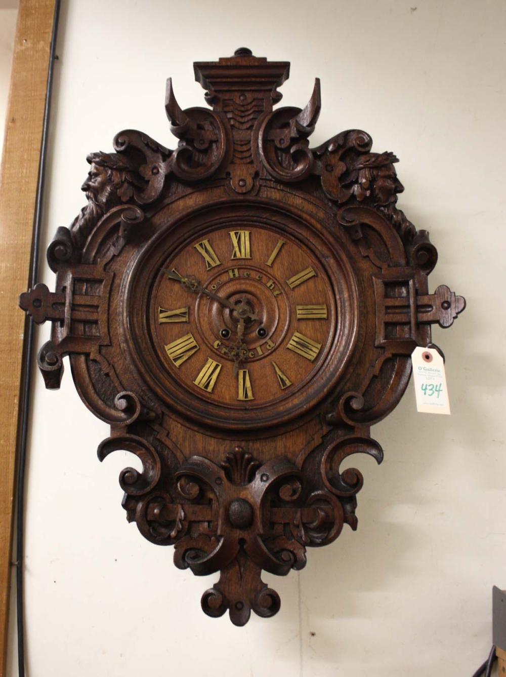 Appraisal: HIGHLY CARVED OAK CARTEL CLOCK Joseph Hecht Crefeld Krefeld German