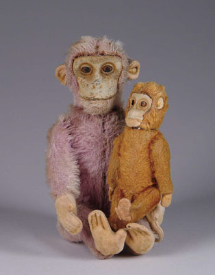 Appraisal: LOT OF TWO SCHUCO MONKEY FLASKS The first being a