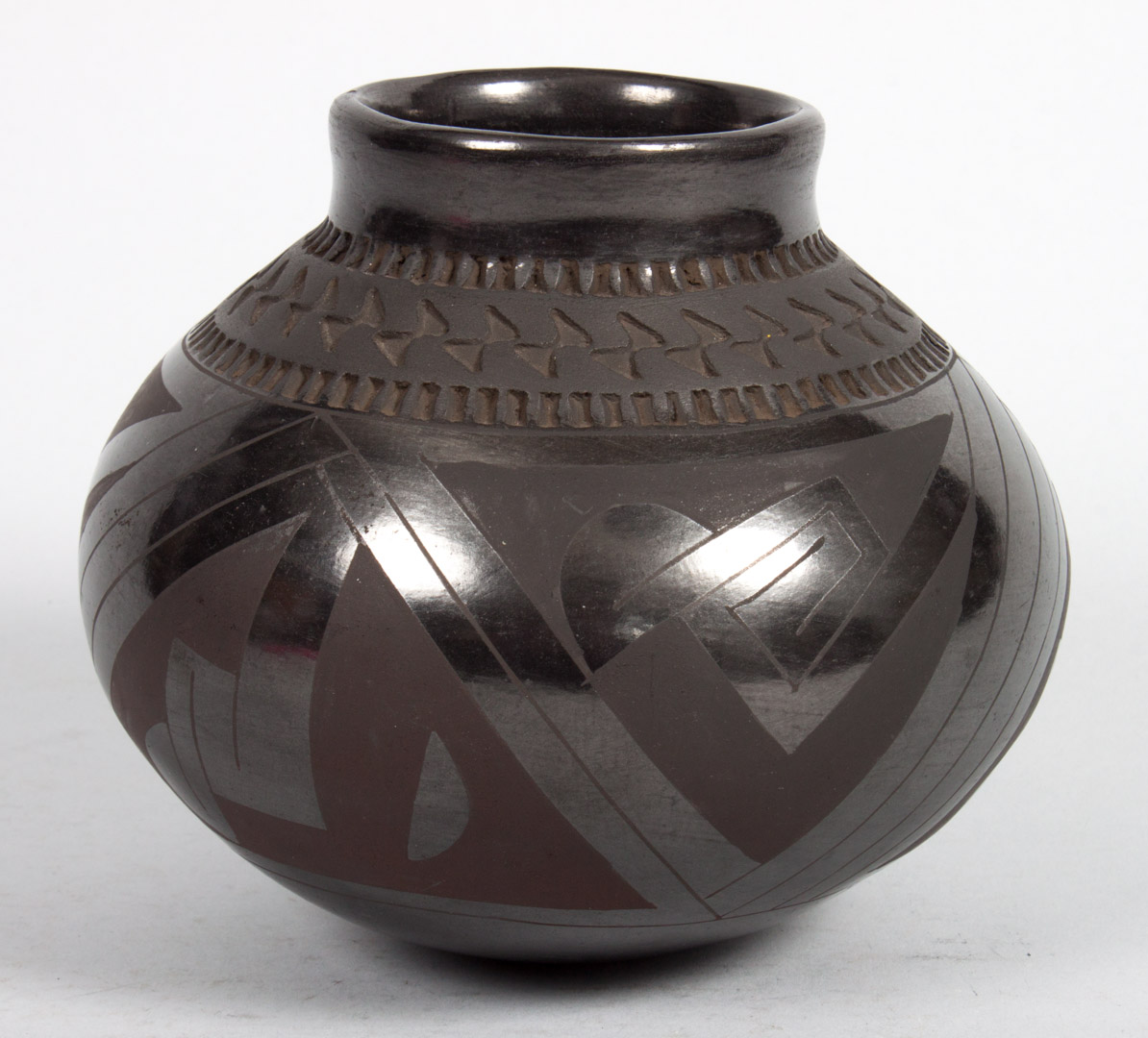 Appraisal: a San Ildefonso blackware pot second half- th century with