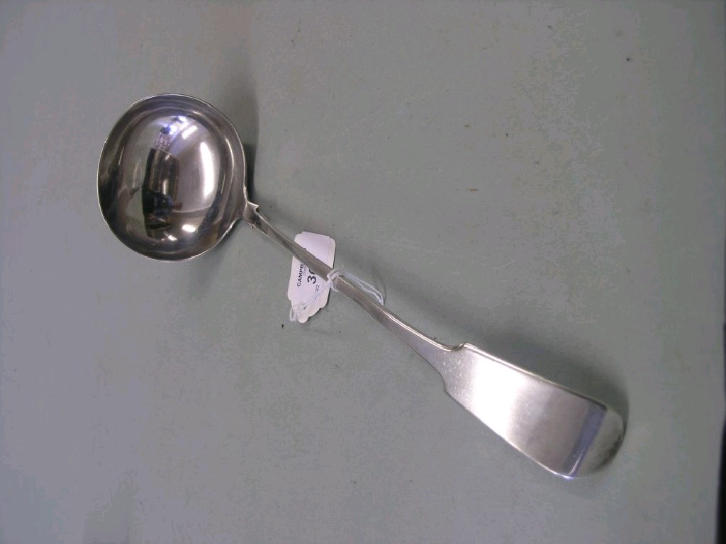 Appraisal: A silver plated fiddle pattern soup ladle and a silver