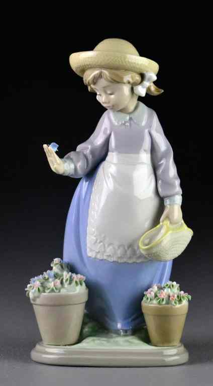 Appraisal: Lladro Porcelain Figurine ''Girl with Butterfly''''Mi Amiga la Mariposa'' depicting