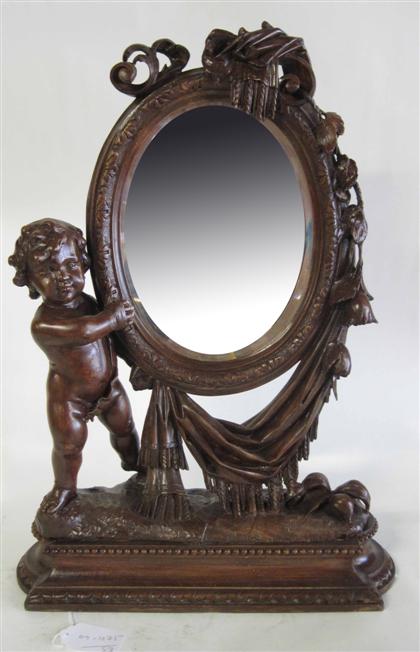 Appraisal: Continental carved walnut vanity mirror th century