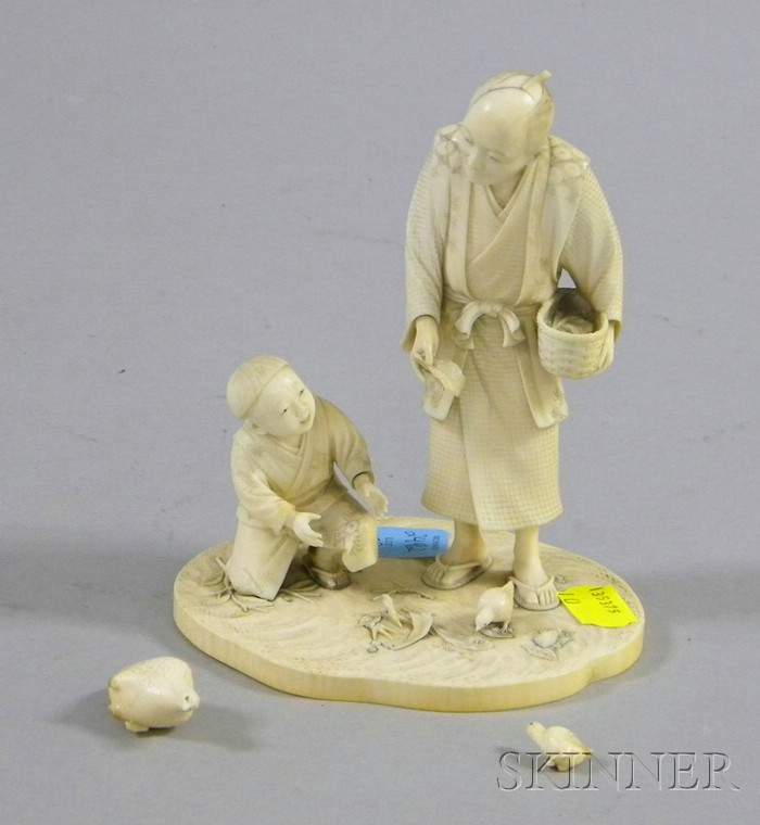 Appraisal: Japanese Ivory Okimono of a Man Boy and Quails two