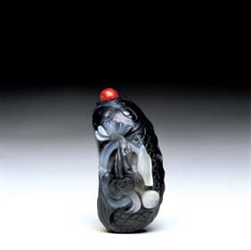 Appraisal: BLACK JADE SNUFF BOTTLE Finely hollowed Chinese carved black jade