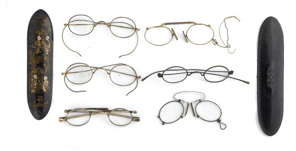 Appraisal: A PAIR OF ENGLISH SILVER SPECTACLES with oval lenses by