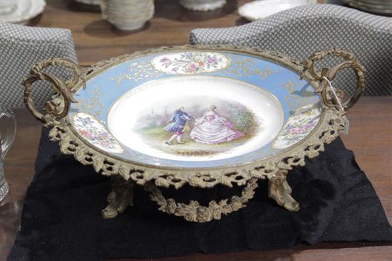 Appraisal: ORNATE COMPOTE Porcelain charger with handpainted and transfer decoration of