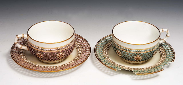 Appraisal: A pair of Sevres porcelain reticulated cabinet cupsand saucers early