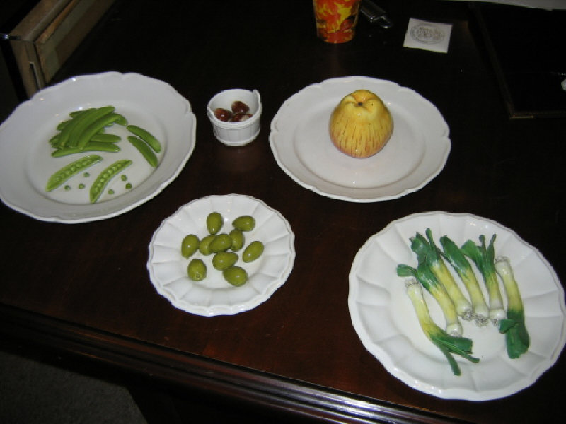 Appraisal: ESTE ITALY Five glazed pottery plates with naturalistically modeled fruits