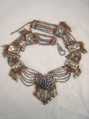 Appraisal: An ethnic Central Asia white metal tests silver coral and