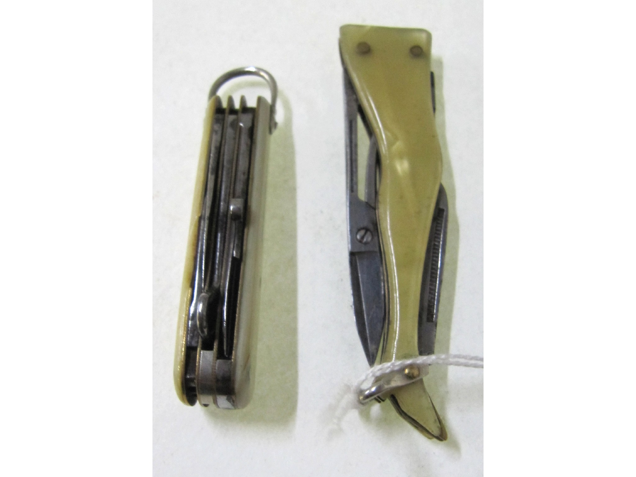 Appraisal: A lot comprising a pocket knife modelled as a lady's