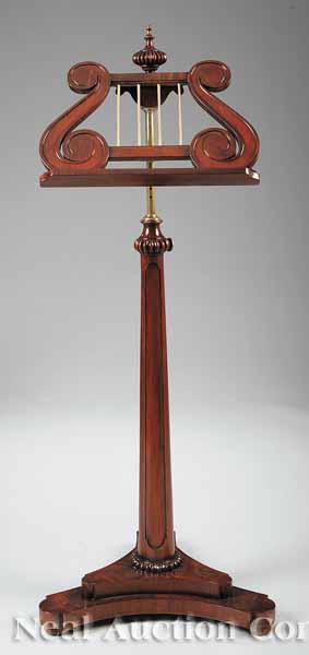 Appraisal: A Fine Regency-Style Mahogany Music Stand with melon finial on