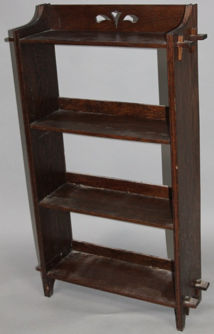 Appraisal: An early thC oak freestanding bookcase the block back with