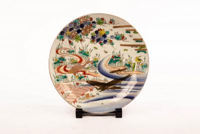 Appraisal: A Japanese charger th Century decorated carp in enamels and