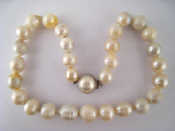 Appraisal: A South Sea cultured pearl necklace with a mabe pearl