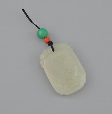 Appraisal: A Carved Jade Pendant Of ovoid form carved on one