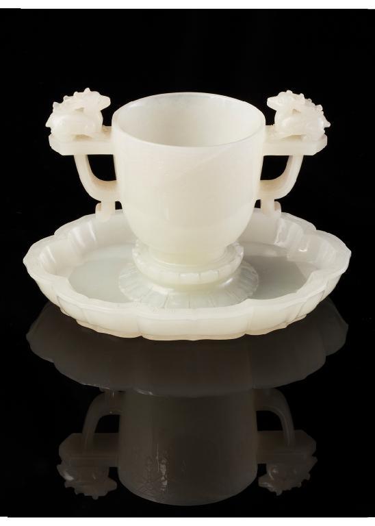 Appraisal: AN EXCEPTIONAL CHINESE WHITE JADE CUP AND SAUCER the cup