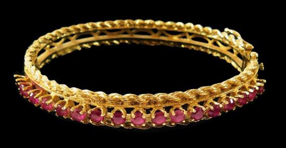 Appraisal: JEWELRY K Ruby bangle bracelet stamped yellow gold sixteen prong-set