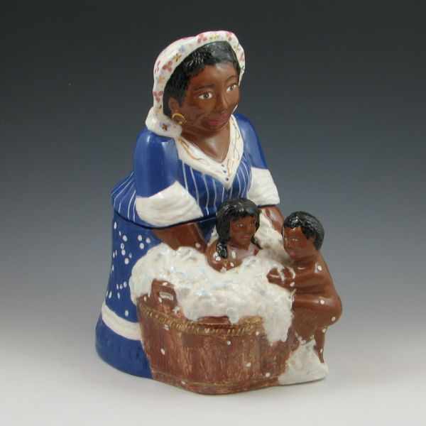 Appraisal: Rick Wisecarver Mammy cookie jar with two kids in their