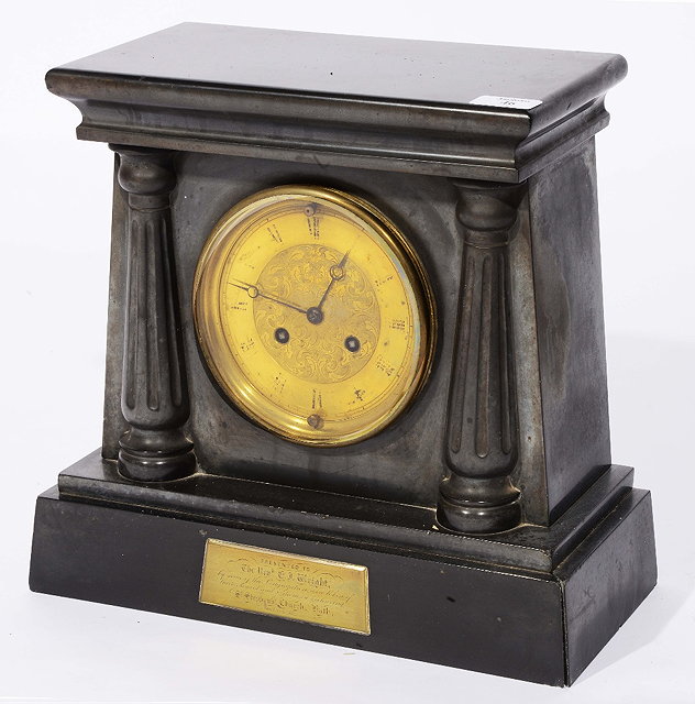 Appraisal: A Greek Revival black slate mantel clockwith striking movement engraved