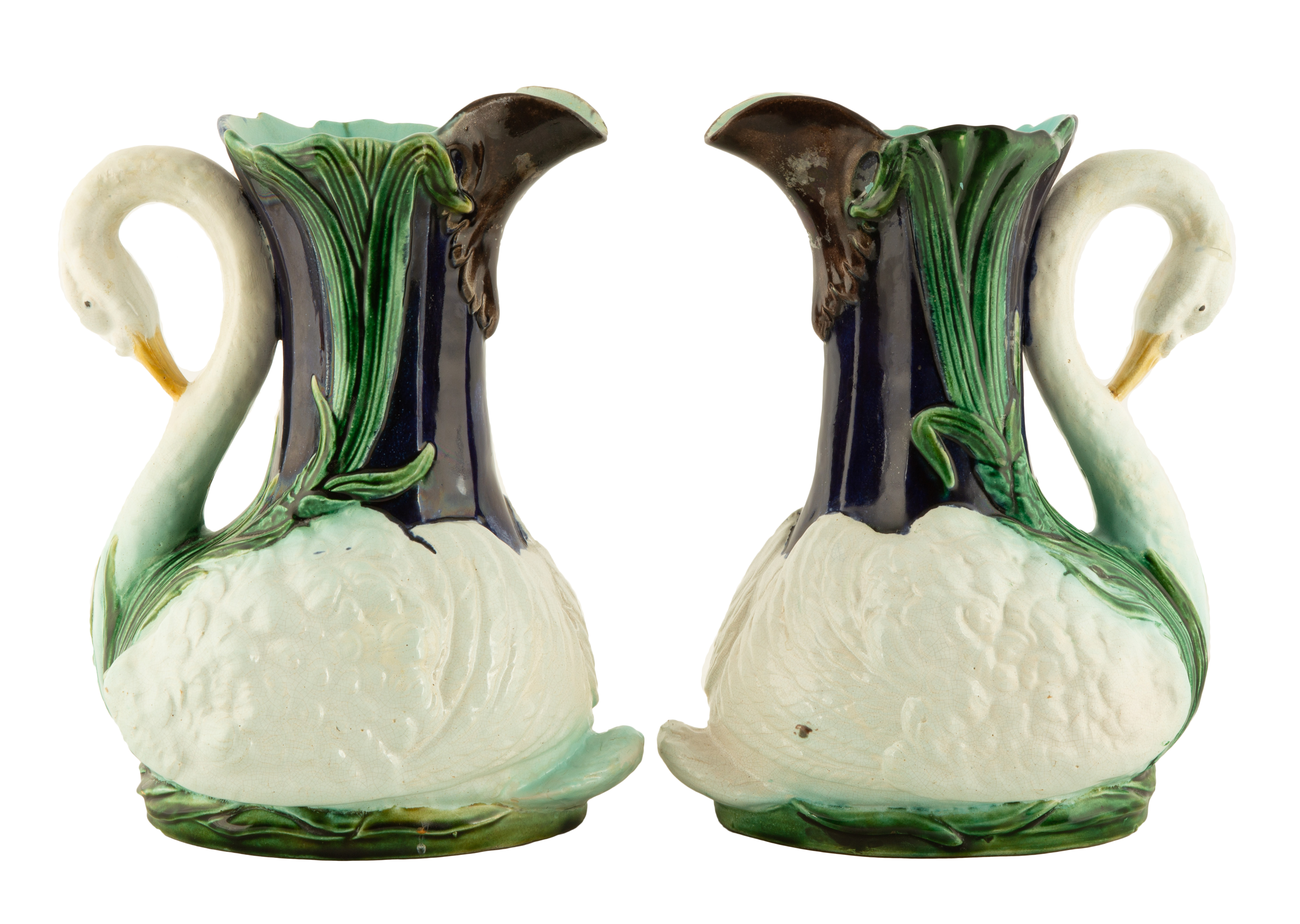 Appraisal: PAIR OF ENGLISH MAJOLICA COBALT SWAN EWERS circa