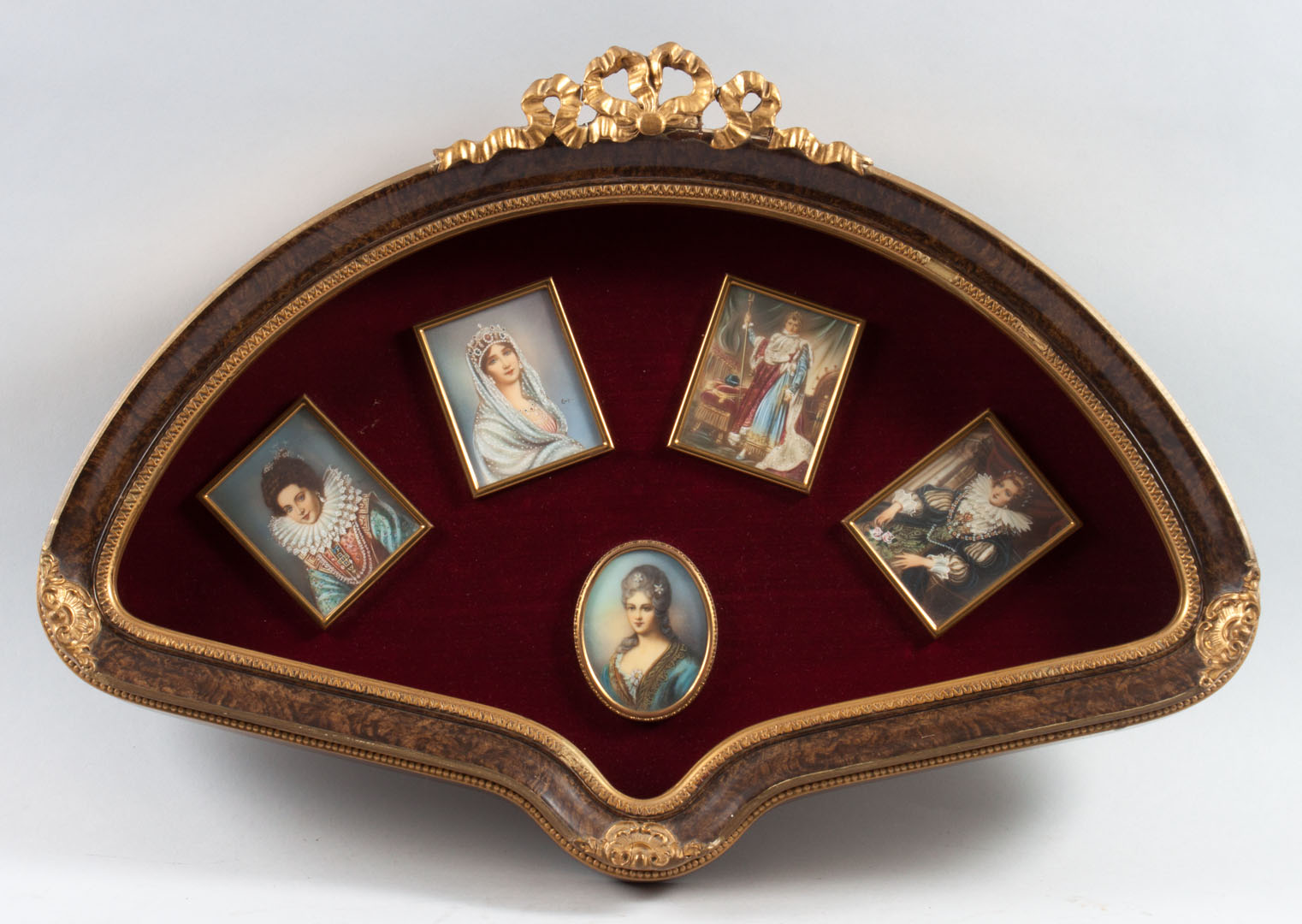 Appraisal: Five portrait miniatures set in shadowbox frame painted portraits include