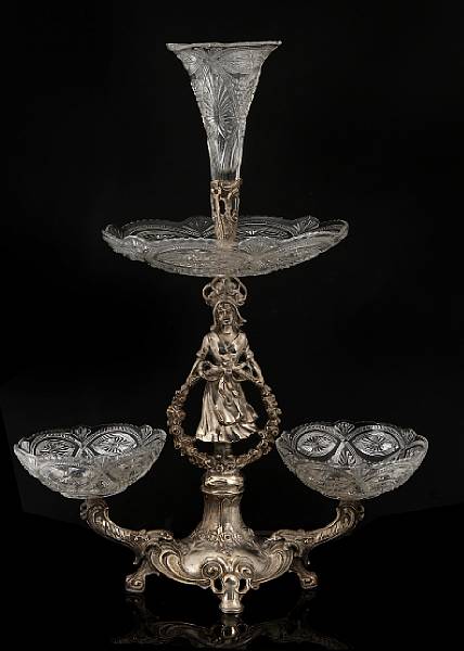 Appraisal: A continental silver plate and molded glass figural epergne Height