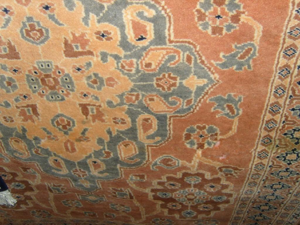 Appraisal: An Eastern wool rug with grey black and cream decoration