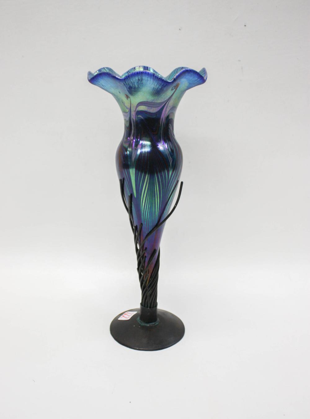 Appraisal: IRIDESCENT STUDIO ART GLASS AND BRONZE VASE the trumpet form