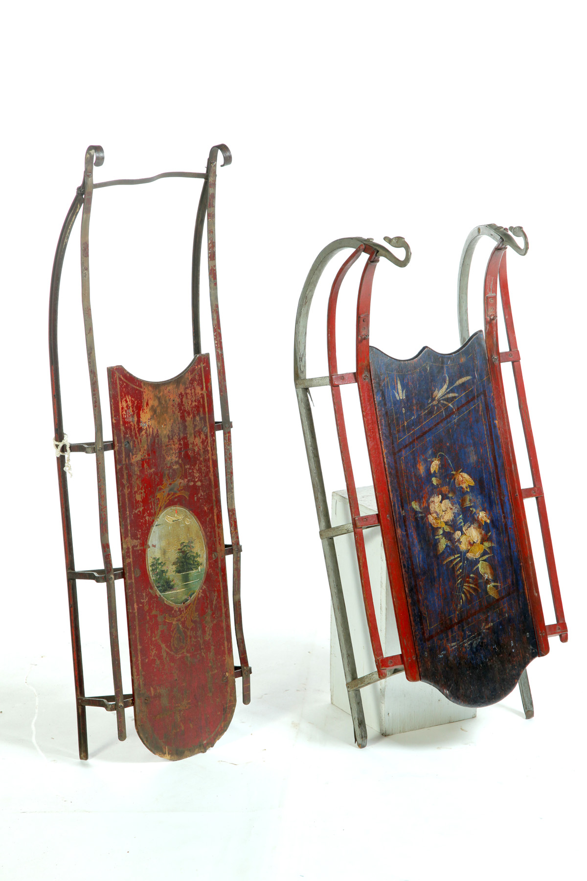 Appraisal: TWO CHILDREN'S SLEDS American th quarter- th century Painted wood