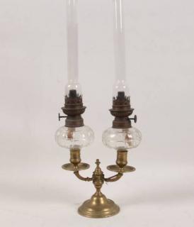 Appraisal: CONTINENTAL BRASS DOUBLE OIL LAMP WITH CRYSTAL FONTS AND ORIGINAL