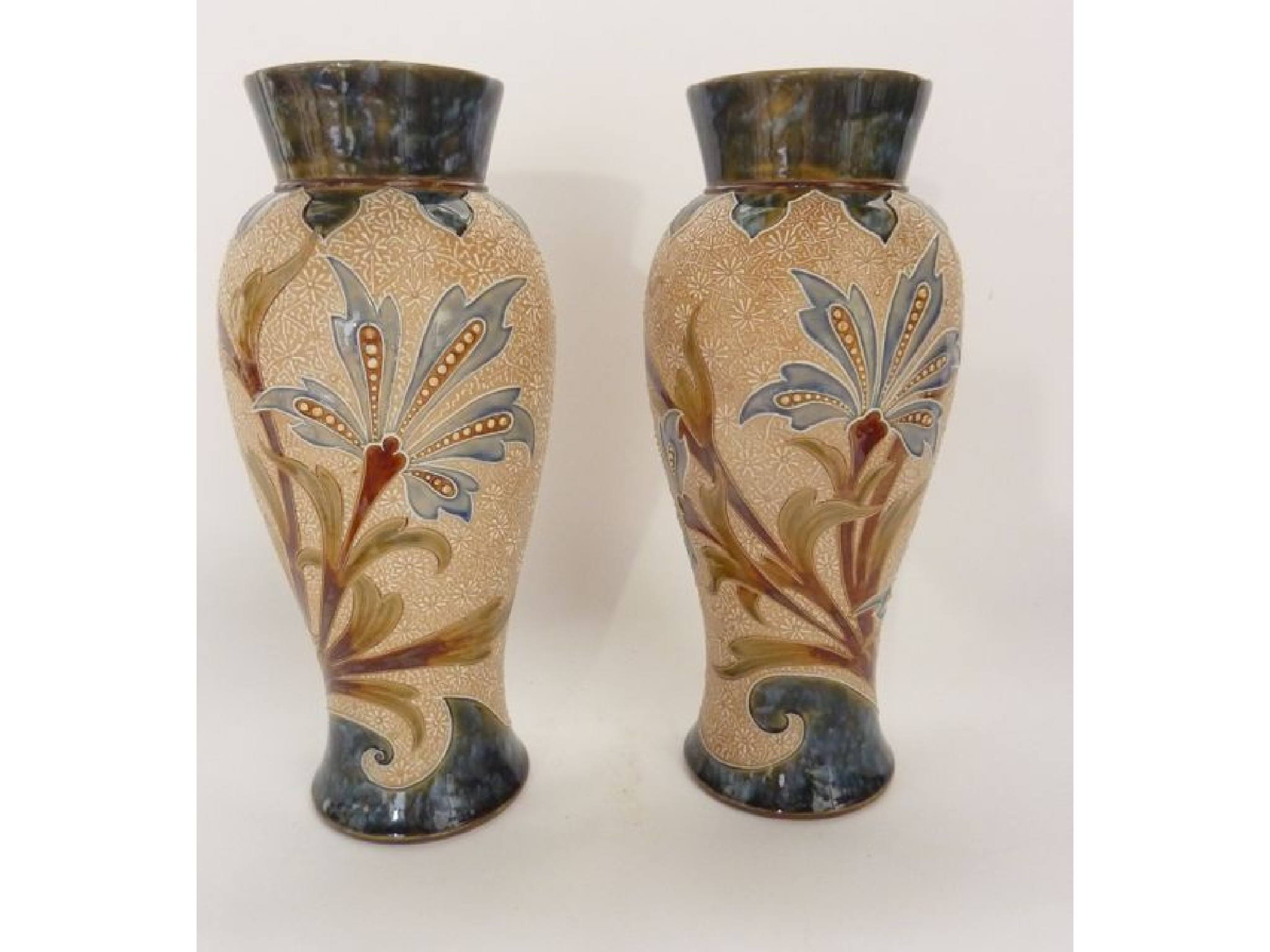 Appraisal: A pair of Royal Doulton vases of baluster shaped form